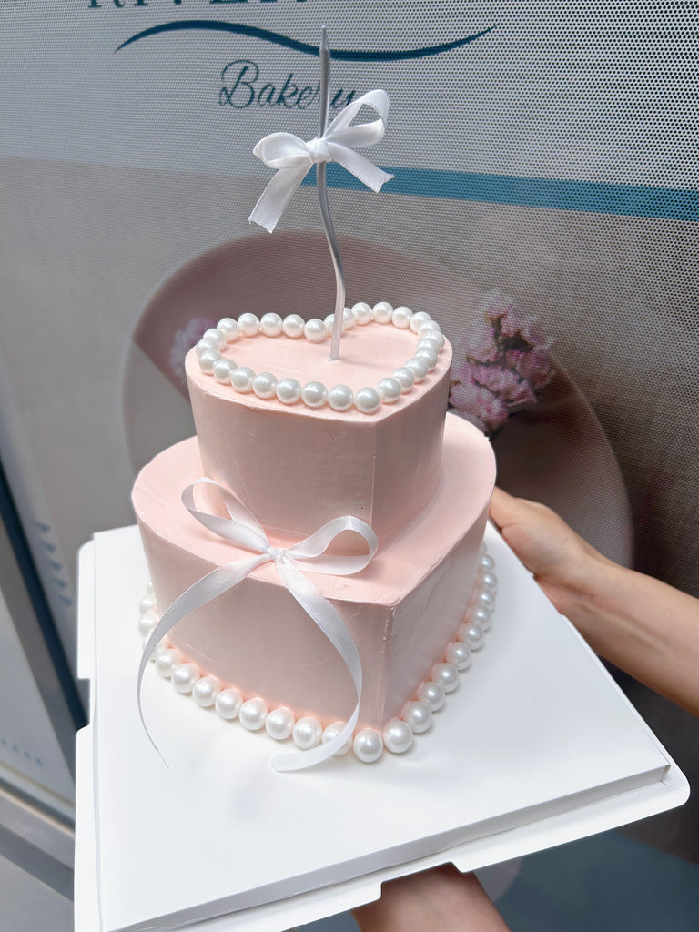 Blushing Pearl Ribbon Heart shape Cake