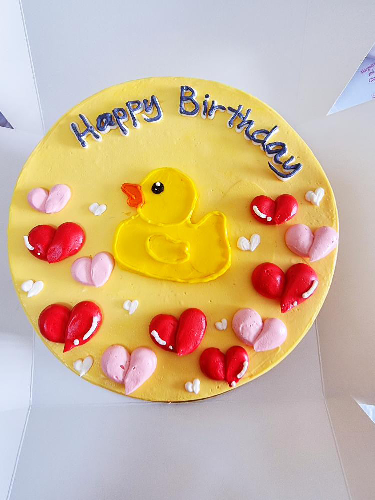 2D Hand Piping Duck Duckie Cake