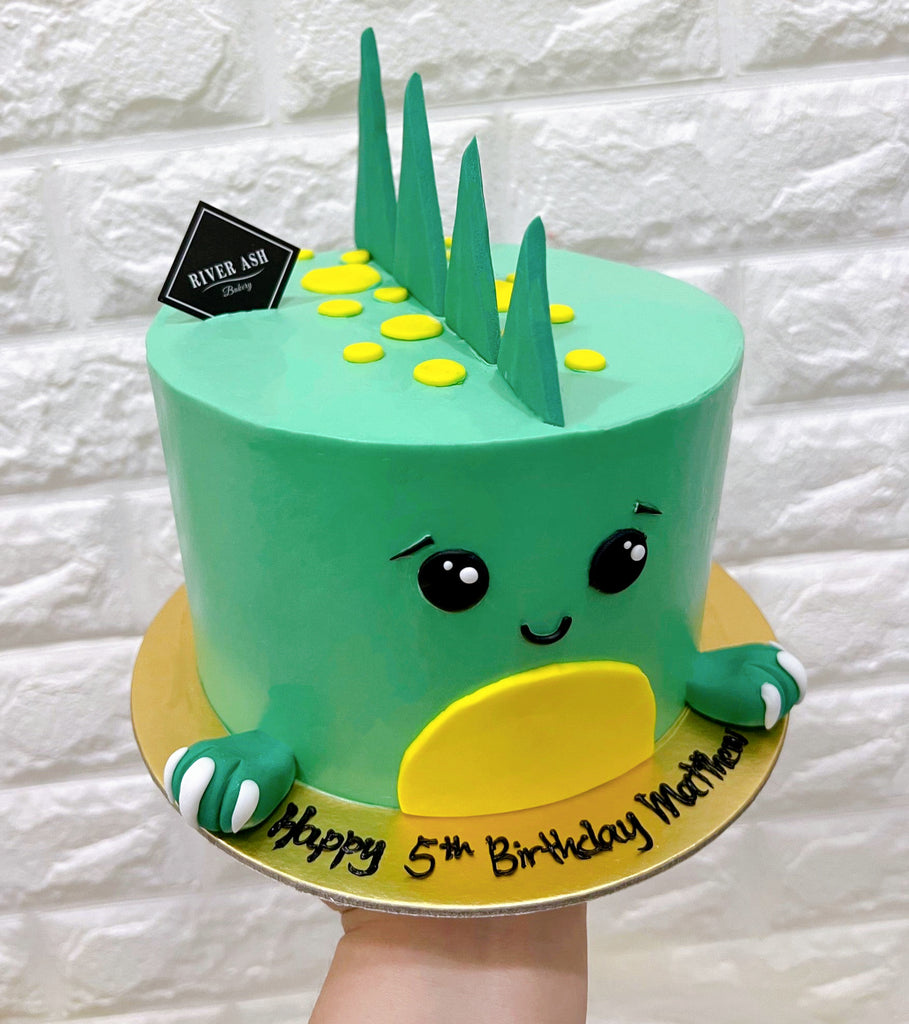 Cute Green Dinosaur Cake