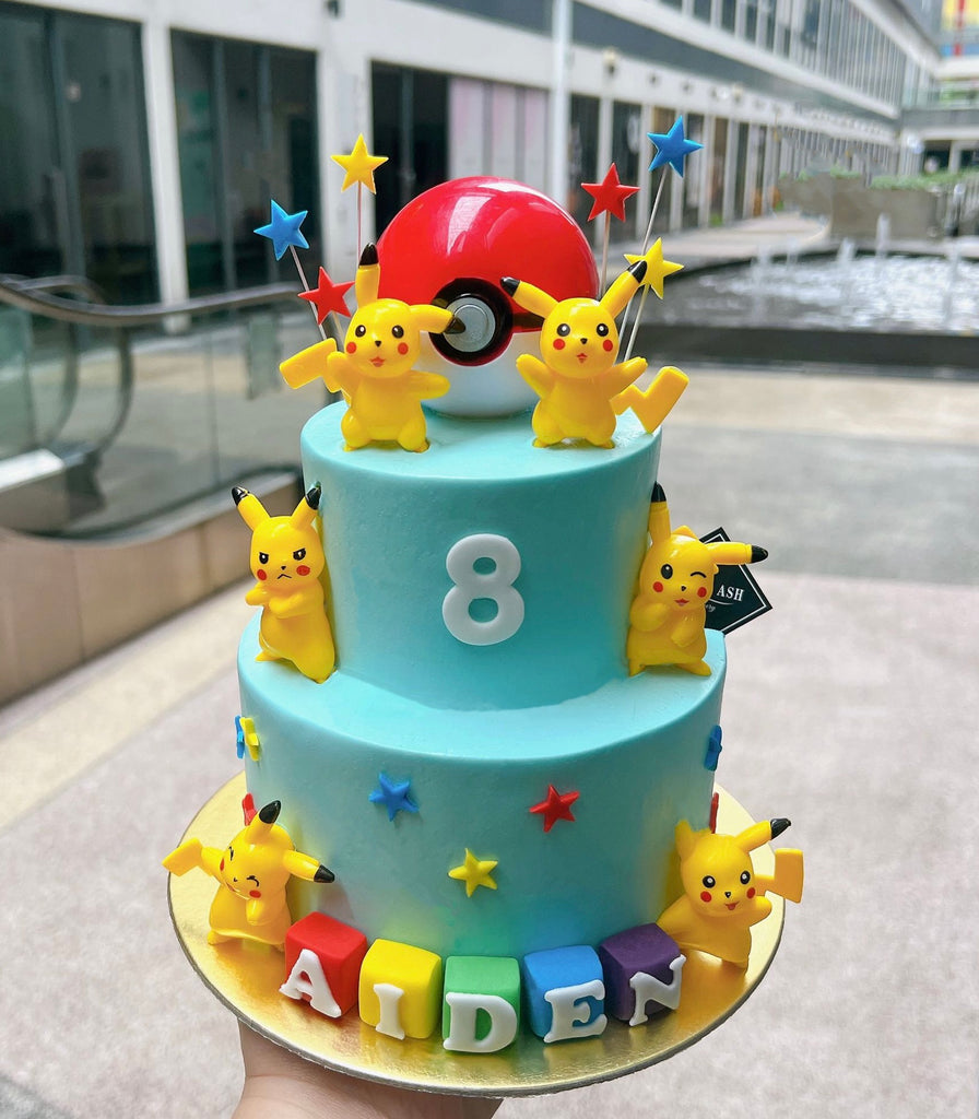 Custom Poke-ball Pikachu Cake