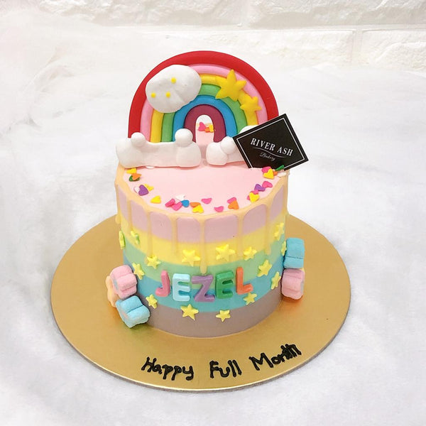4" Tall pastel Rainbow Cake with rainbow topper