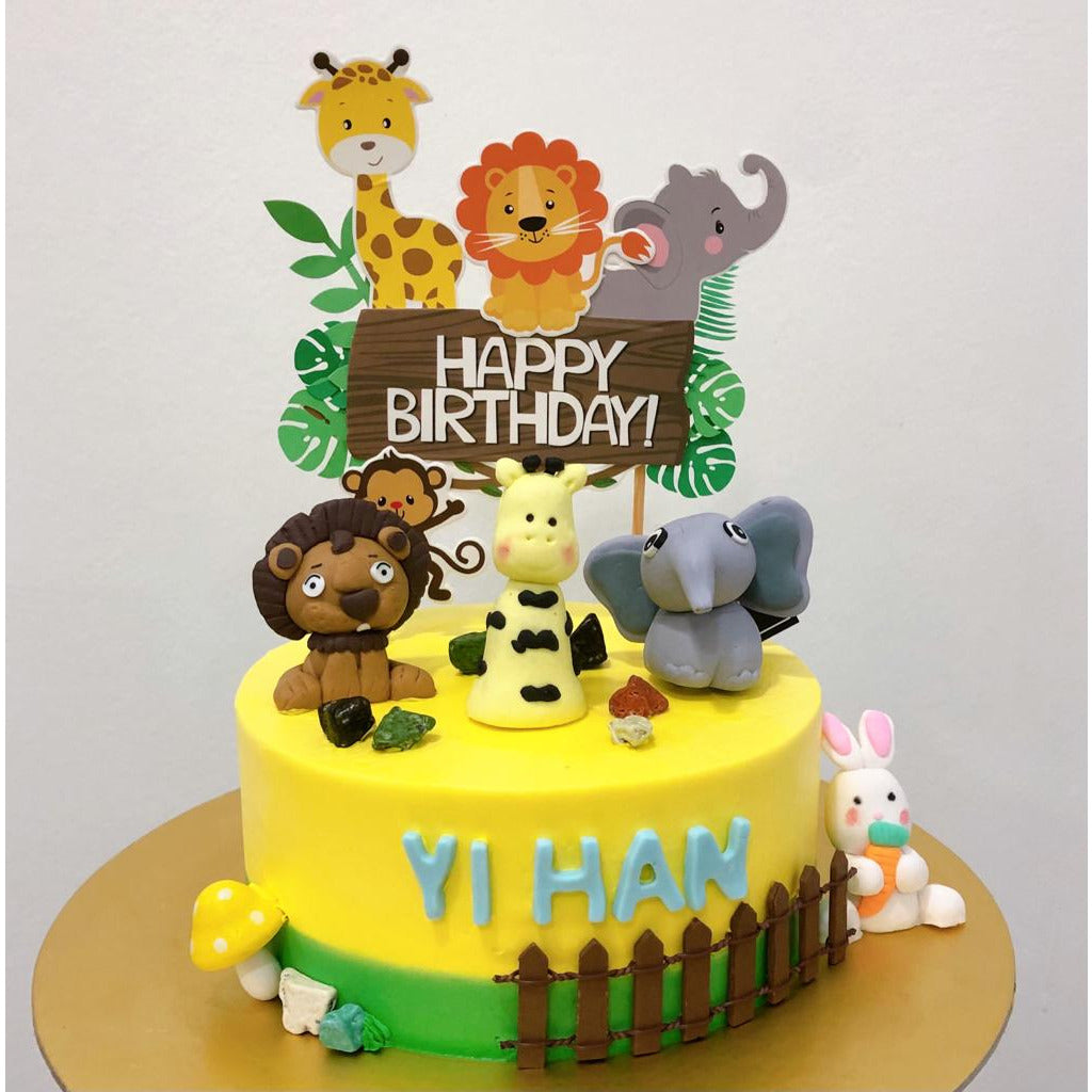 Birthday cake with various zoo animals Stock Photo - Alamy